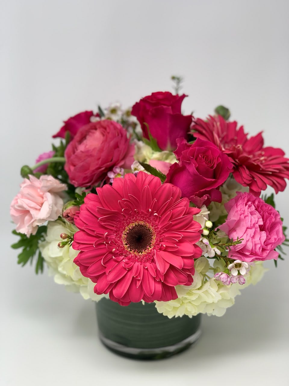 Pink Delight  - May consist of white hydrangea, gerberas daisies, ranunculus, roses, wax 