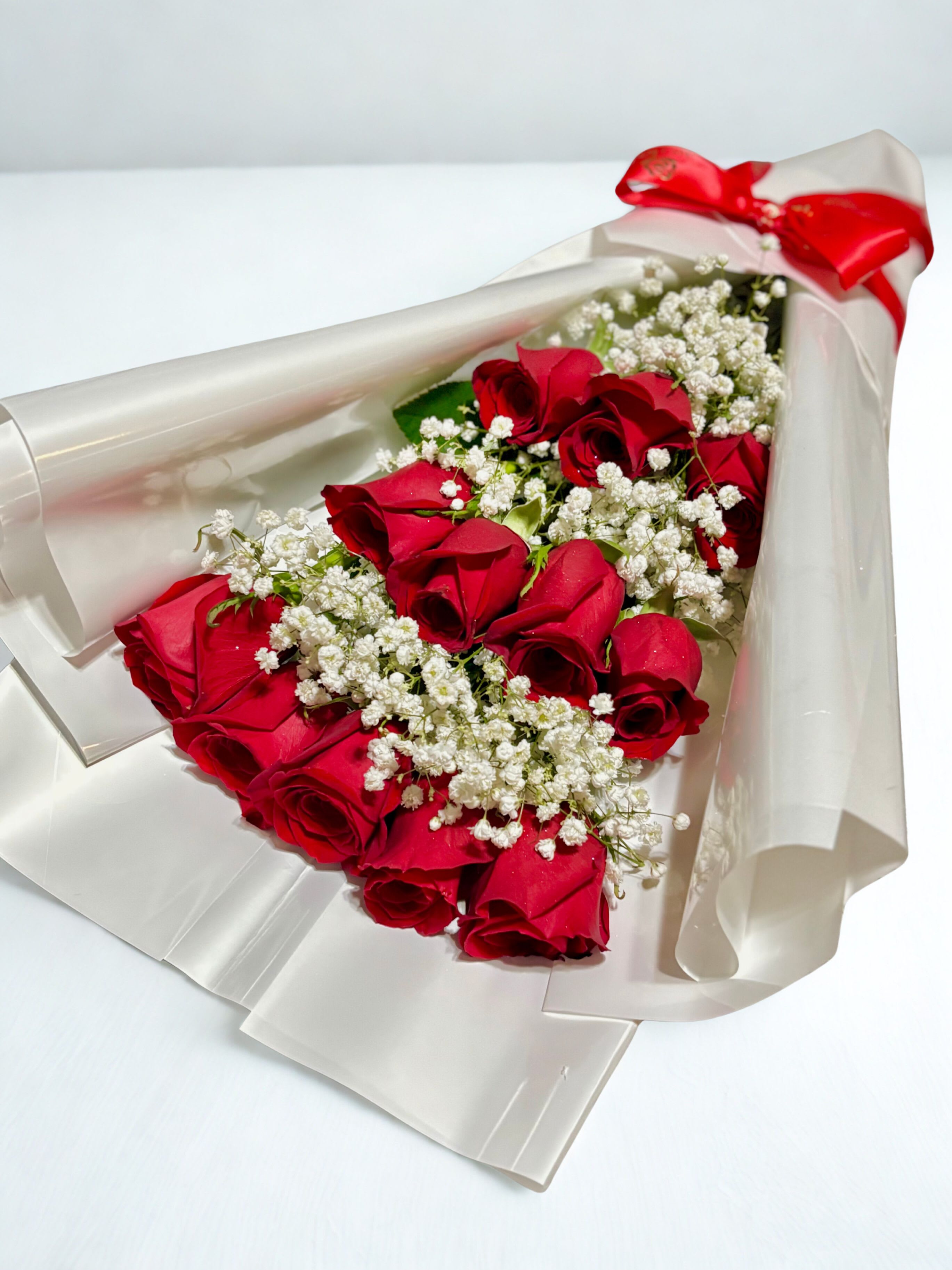 Roses and baby breath - Enjoy 12 roses with baby breath combination. Surprise your loved one during valentines season! 