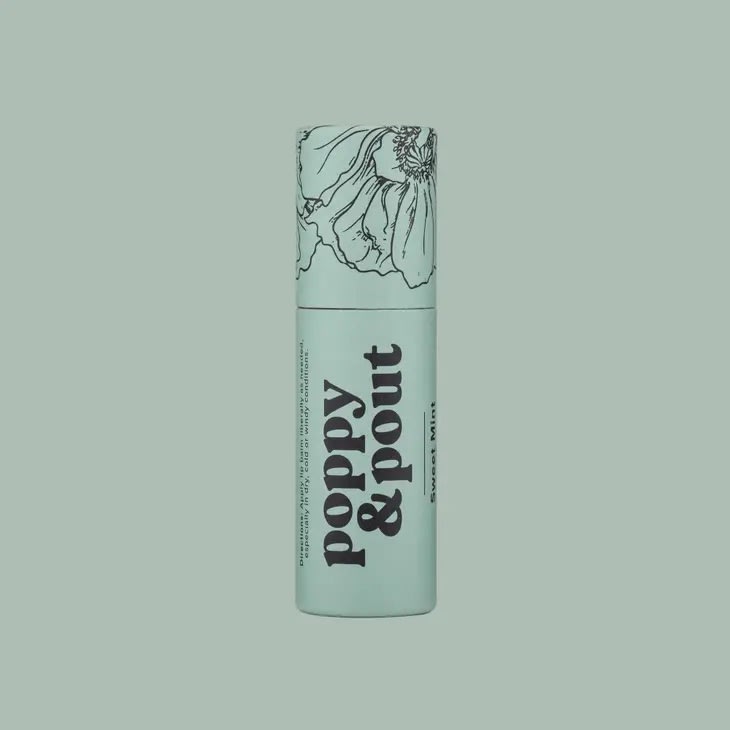 Mint-green lip balm tube with floral line art and bold text