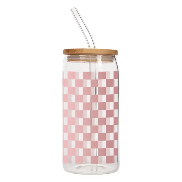 Clear glass tumbler with pink checker pattern, bamboo lid, and straw