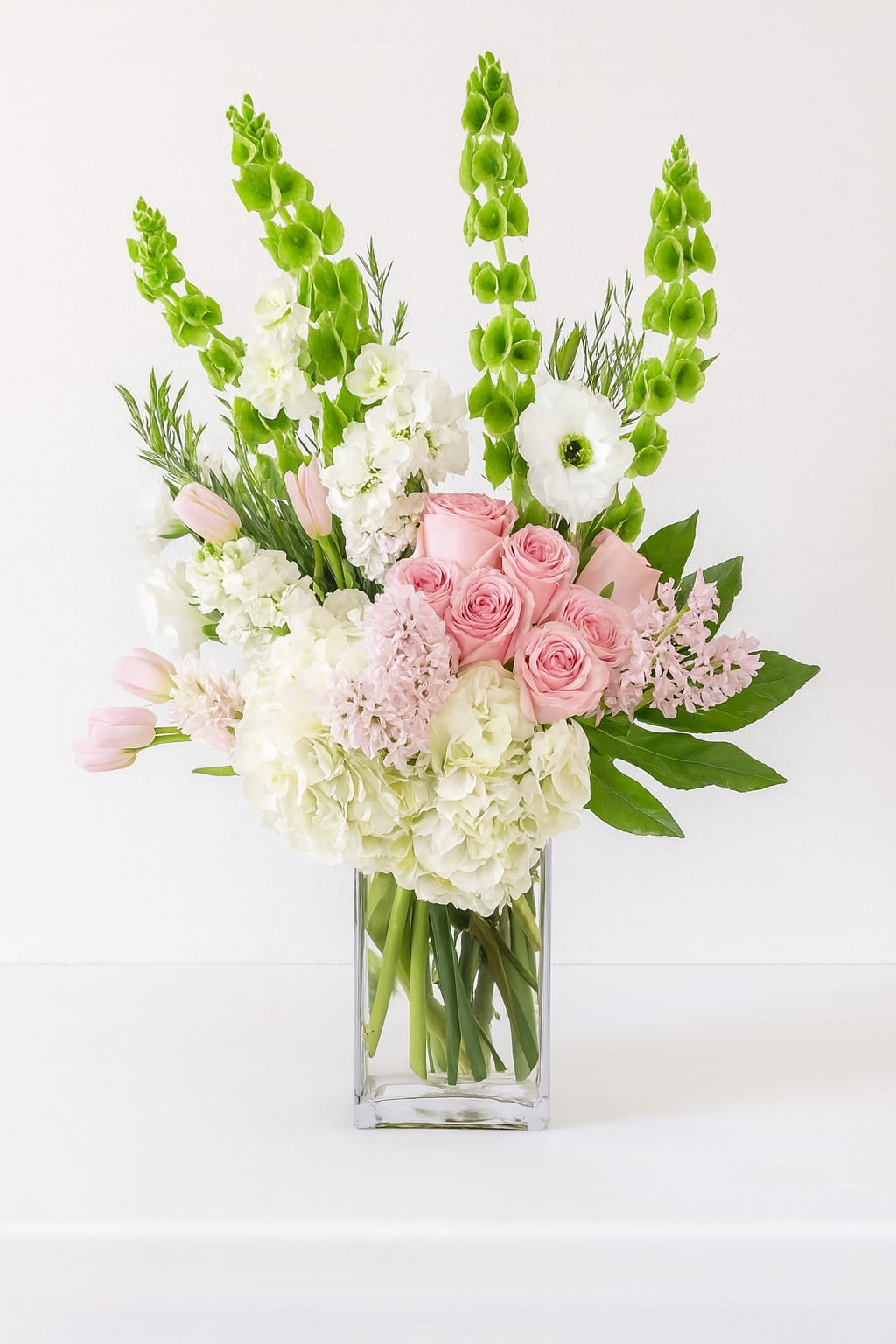Pink Diamond by BloomNation™ - A giant luxury arrangement? Sign us up. Instead of sending standard red roses, send them something soft and pretty and sweet to say "I care".  Approximate Dimensions: 20"D x 30"H