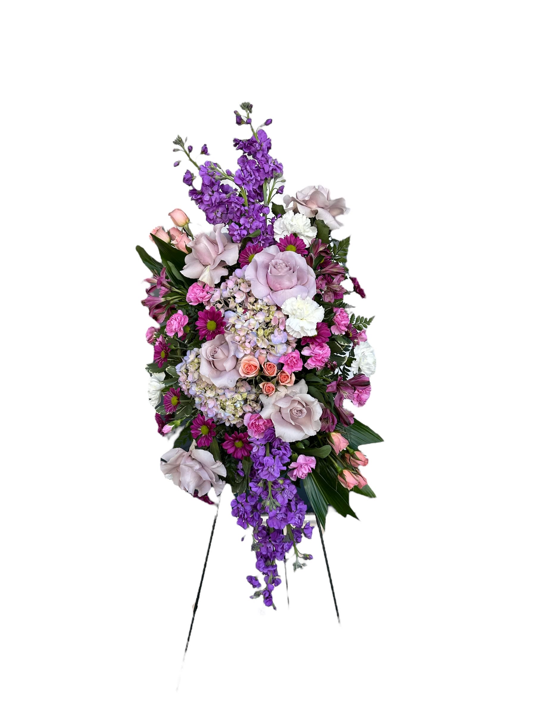 Tall standing floral spray with purple, pink, and white blooms