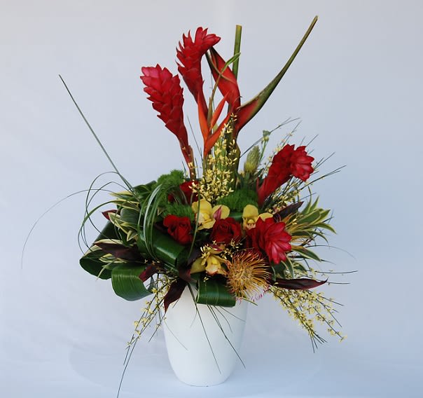 Tropical Queen - This is a beautiful mixture of topical flowers, roses, orchids and an assortment of artistic greenery.