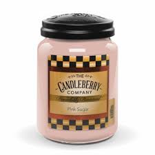 Pink jar candle with a black lid and printed label