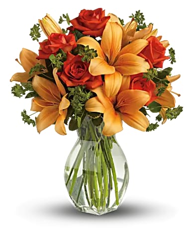 Fiery Lily &amp; Rose Bouquet - Ignite their heart with this inspirational gift of warm orange roses and lilies. As wondrous as a summer sunset - but quite a bit more fragrant! - it's a versatile choice for men and women alike.