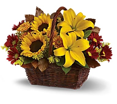Golden Days Basket - Send warm autumn sunshine to a special friend or relative with this golden gift basket of flowers. Yellow lilies and sunflowers make everyone smile!
