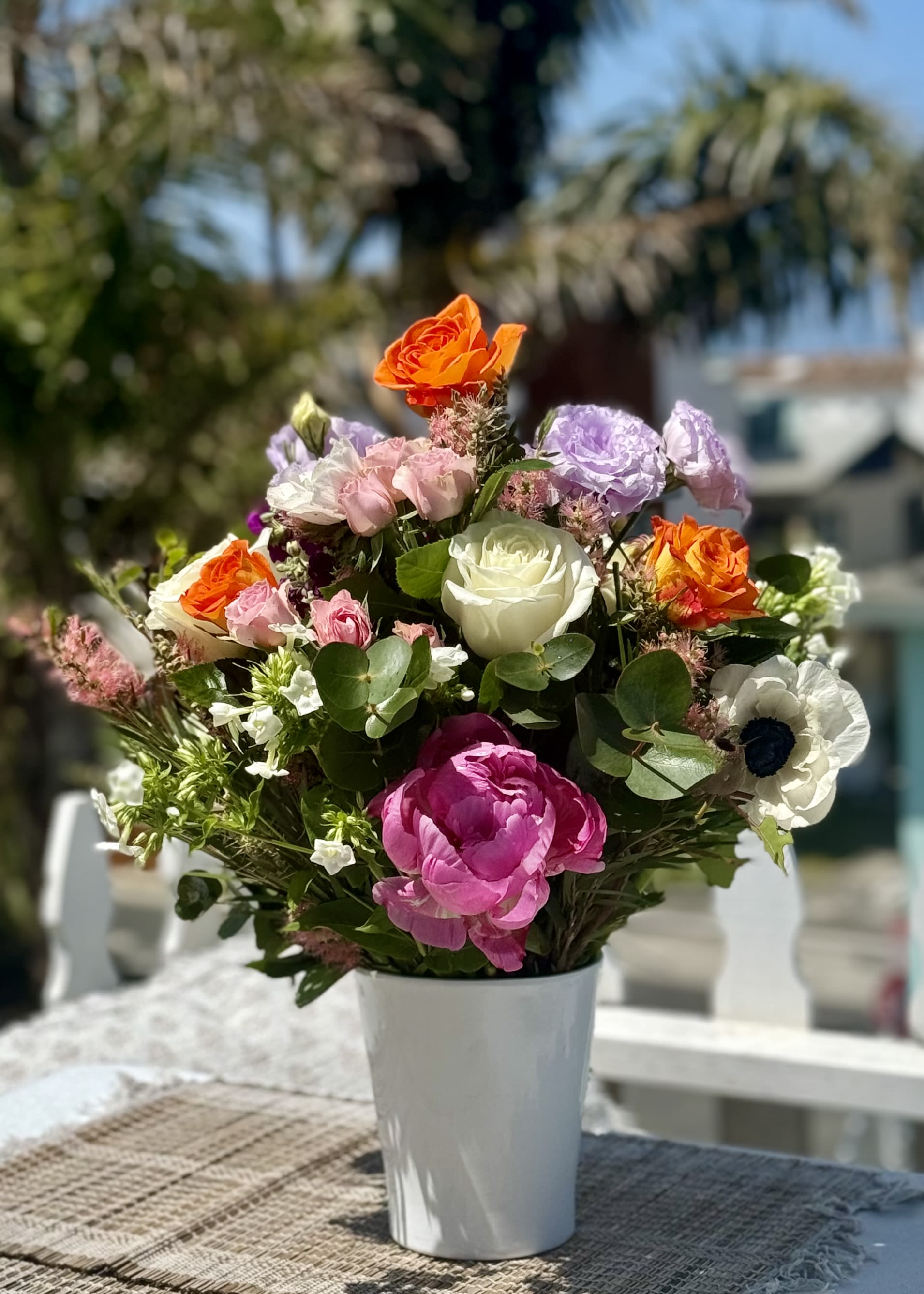 FLOWER FIELDS  - A beautiful combination of in season flowers. A bright combination of roses, peonies, anemones and very pretty in season greens.
