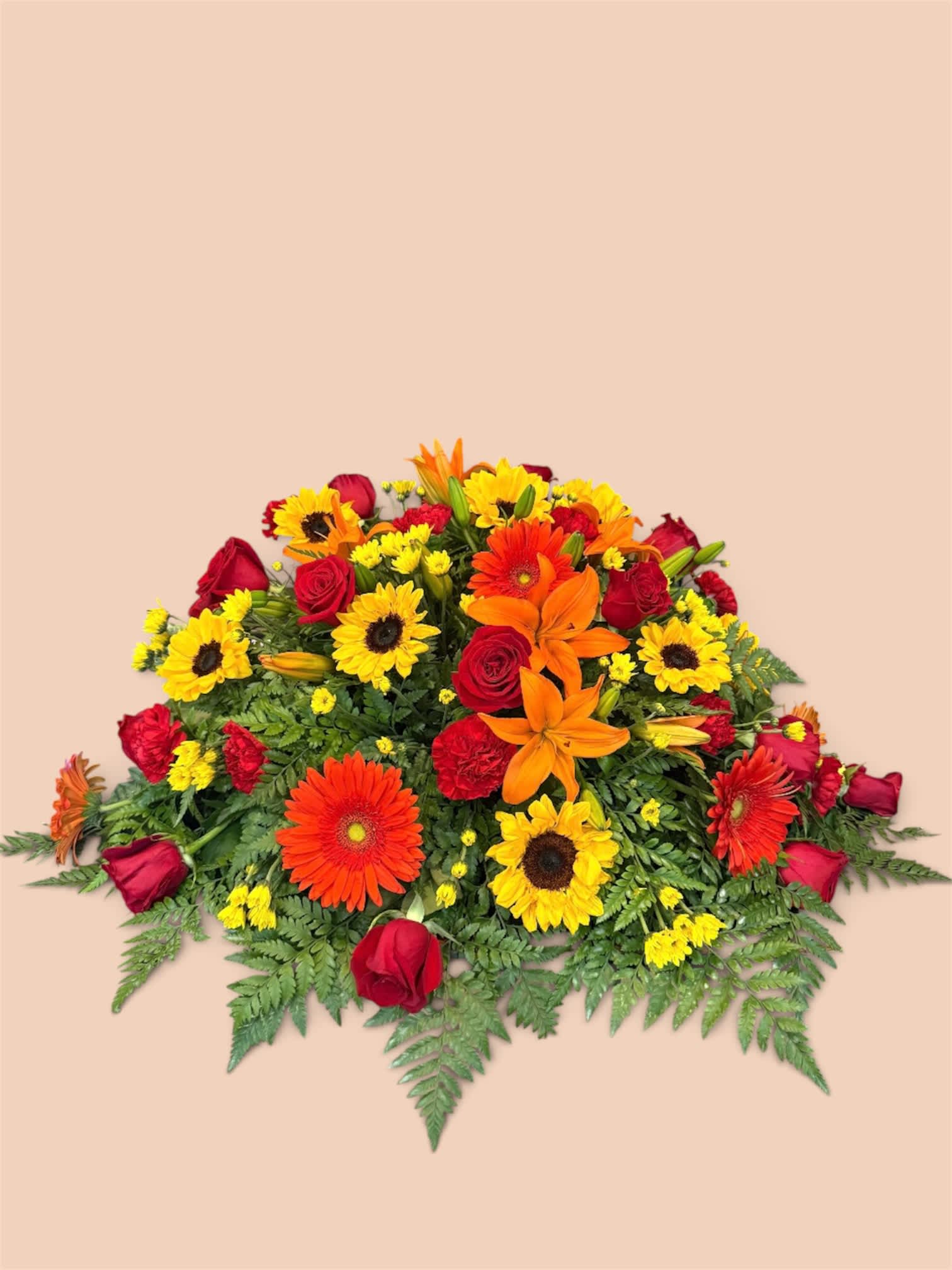 Bright mixed bouquet with red roses, orange lilies, and yellow daisies