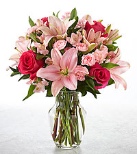 Eckert Florist's FTD You Had Me At Pink Bouquet - You Had Me at Pink Bouquet brings together an array of pink blossoms of blushing color to create a simply fantastic gift. 