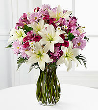 Eckert Florist's FTD Lavender Fields Bouquet - This Lavender Fields Mixed Flower Bouquet is set to send your warmest greetings boasting with a soft array of enchanting colors, including lavender, purple, and white. *Flowers and vase may vary 
