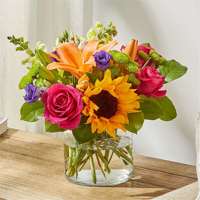 Eckert Florist's FTD Best Day Bouquet - Make this day their best day. We will handcraft a colorful array of flowers in a clear glass vase to create a celebration in bloom. Perfect to give for a special reason or to simply share a smile. *Flower variety and colors may vary.