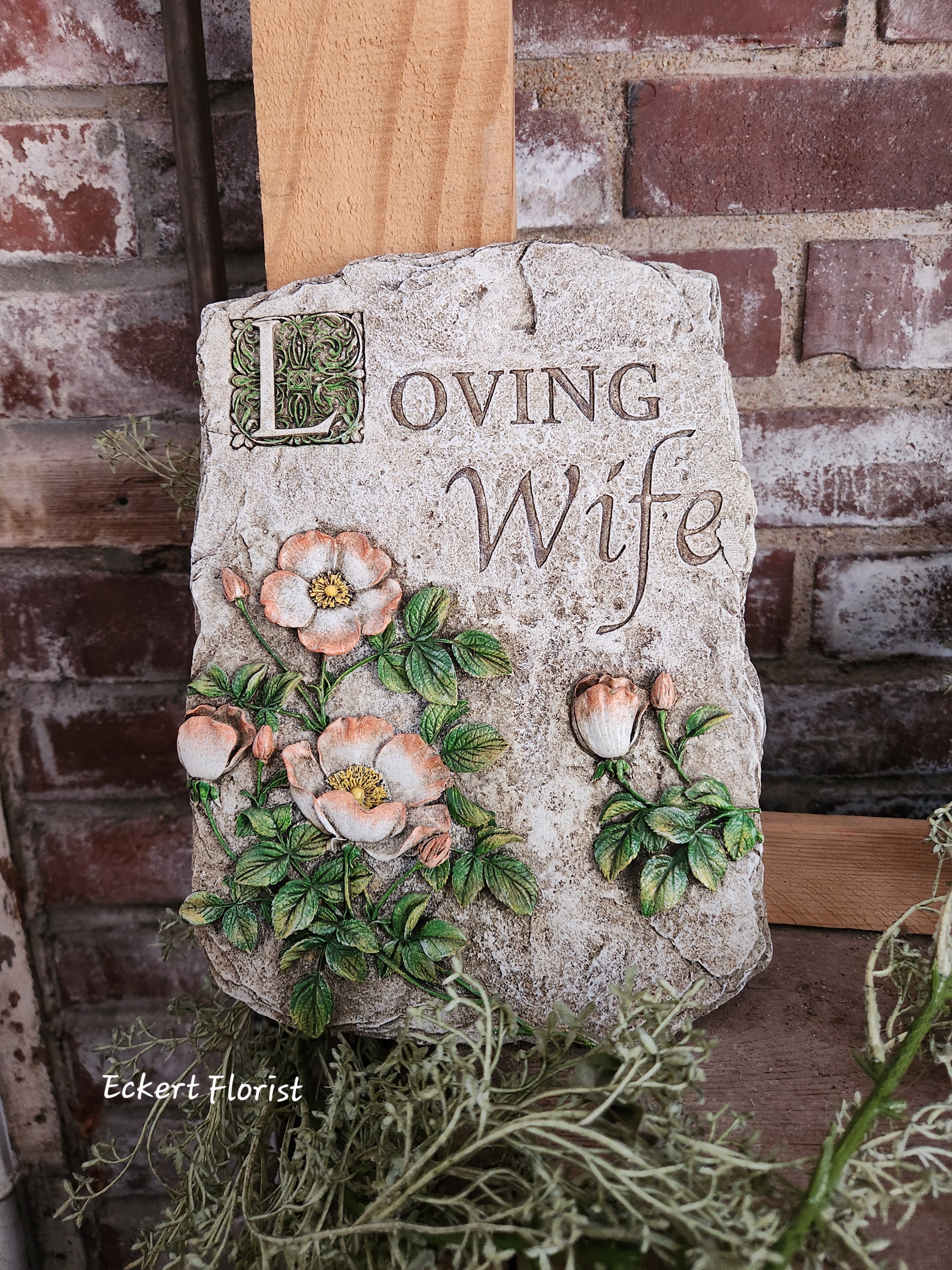 Eckert Florist's "Wife" Memorial Stone - Resin stone measures approx. 7.5" W X 10" H *May be added to a fresh arrangement or green plant. See Deluxe and/or Premium upgrades. *See Add-on Section for Display Easel