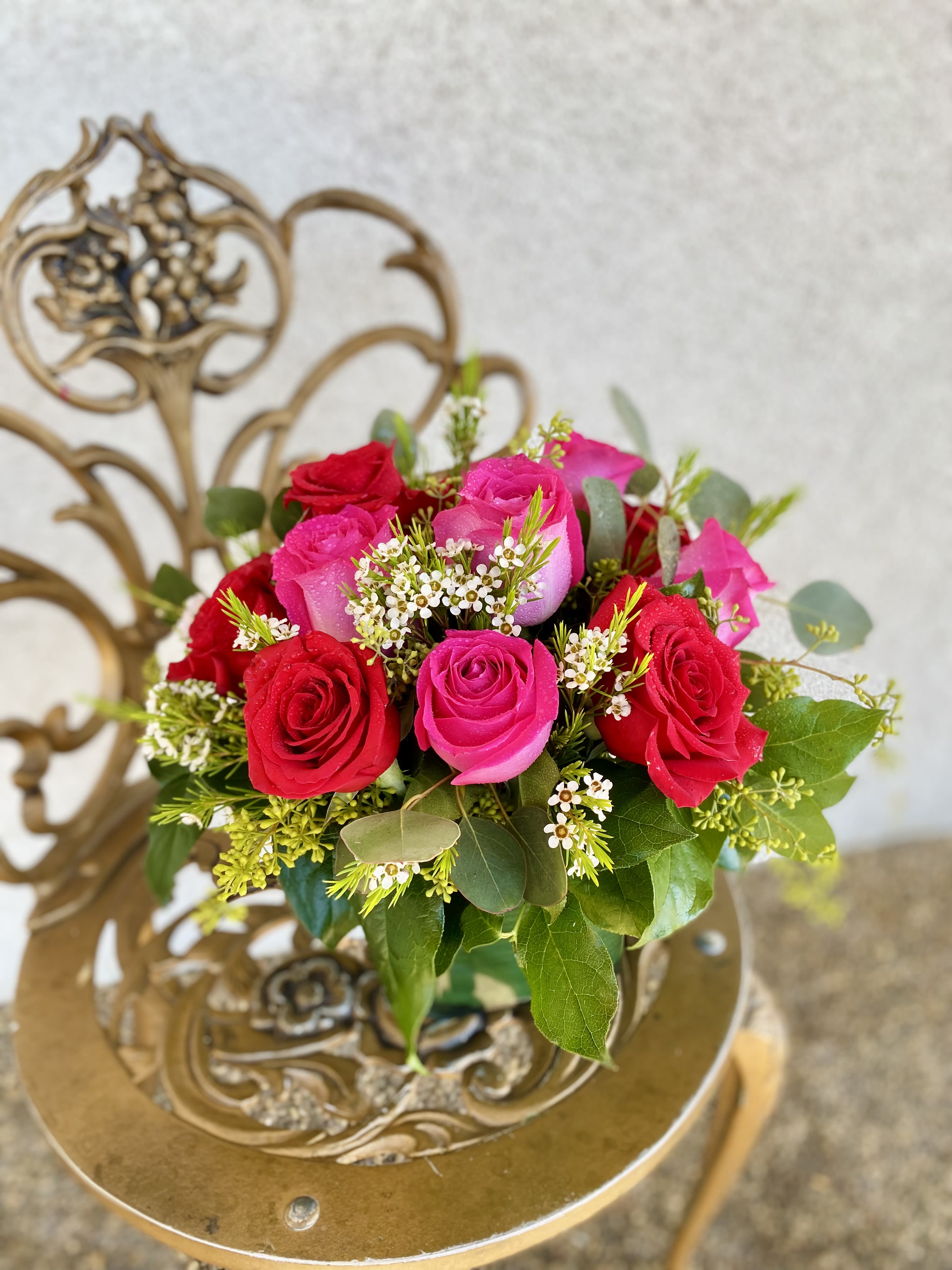 The Port Wine - Hot pink and red roses compliment each other beautifully in this design. Simple, with minimal greenery, this is a fantastic way to say "thinking of you" without being showy or grandiose.
