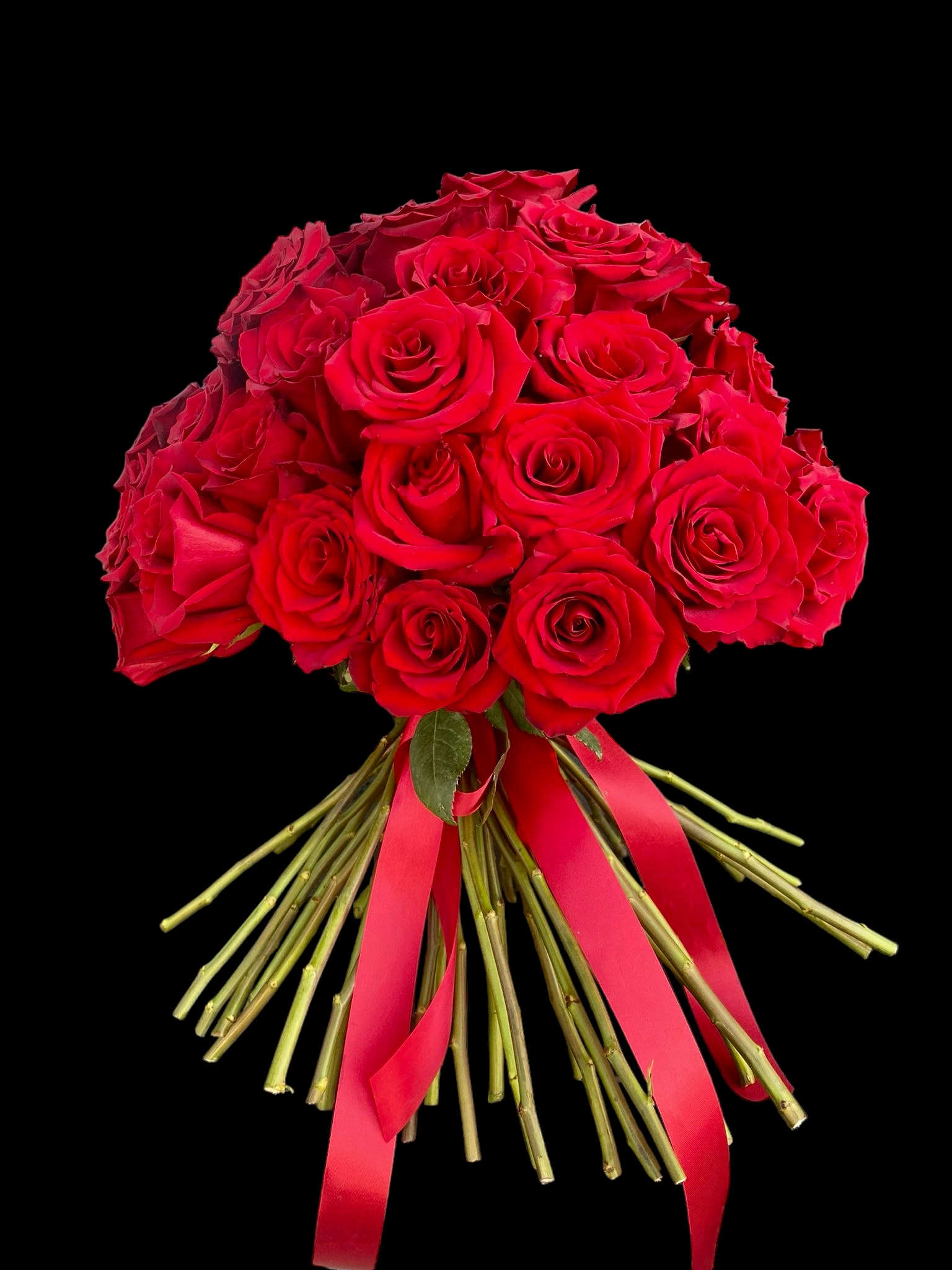 Bouquet of red roses tied with a red ribbon