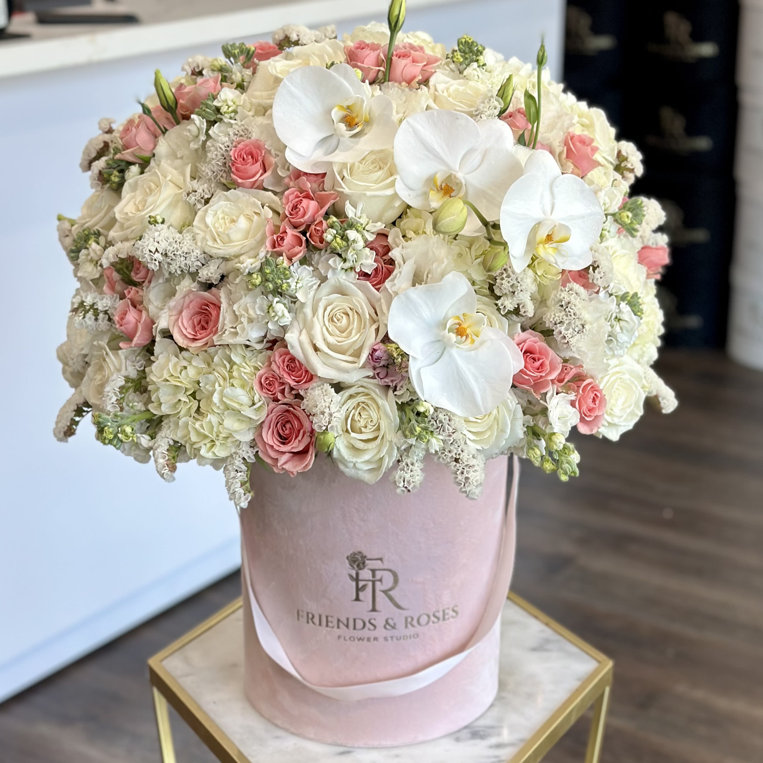 Belinda - Our top designer has created a breathtaking arrangement that is truly a masterpiece. For any occasion, this arrangement is a wonderful present.
