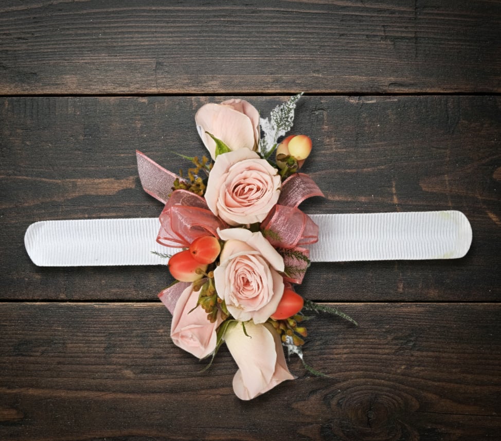 Blush pink rose wrist corsage with berries on a white band