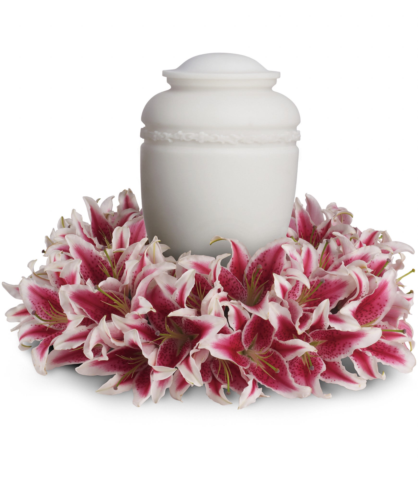Glorious Life Wreath by Teleflora - Bring the gift of grace to the service with this serenely lovely wreath of fragrant pink lilies. It is a fitting tribute to someone loved by so many. T257-1A  
