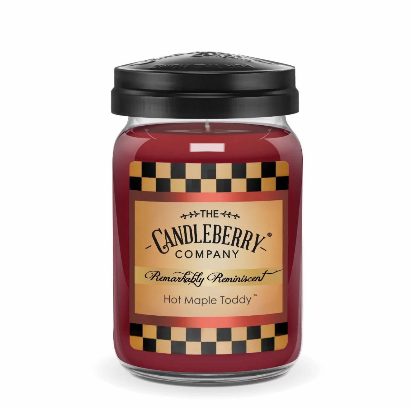 Red jar candle with a black lid and labeled front
