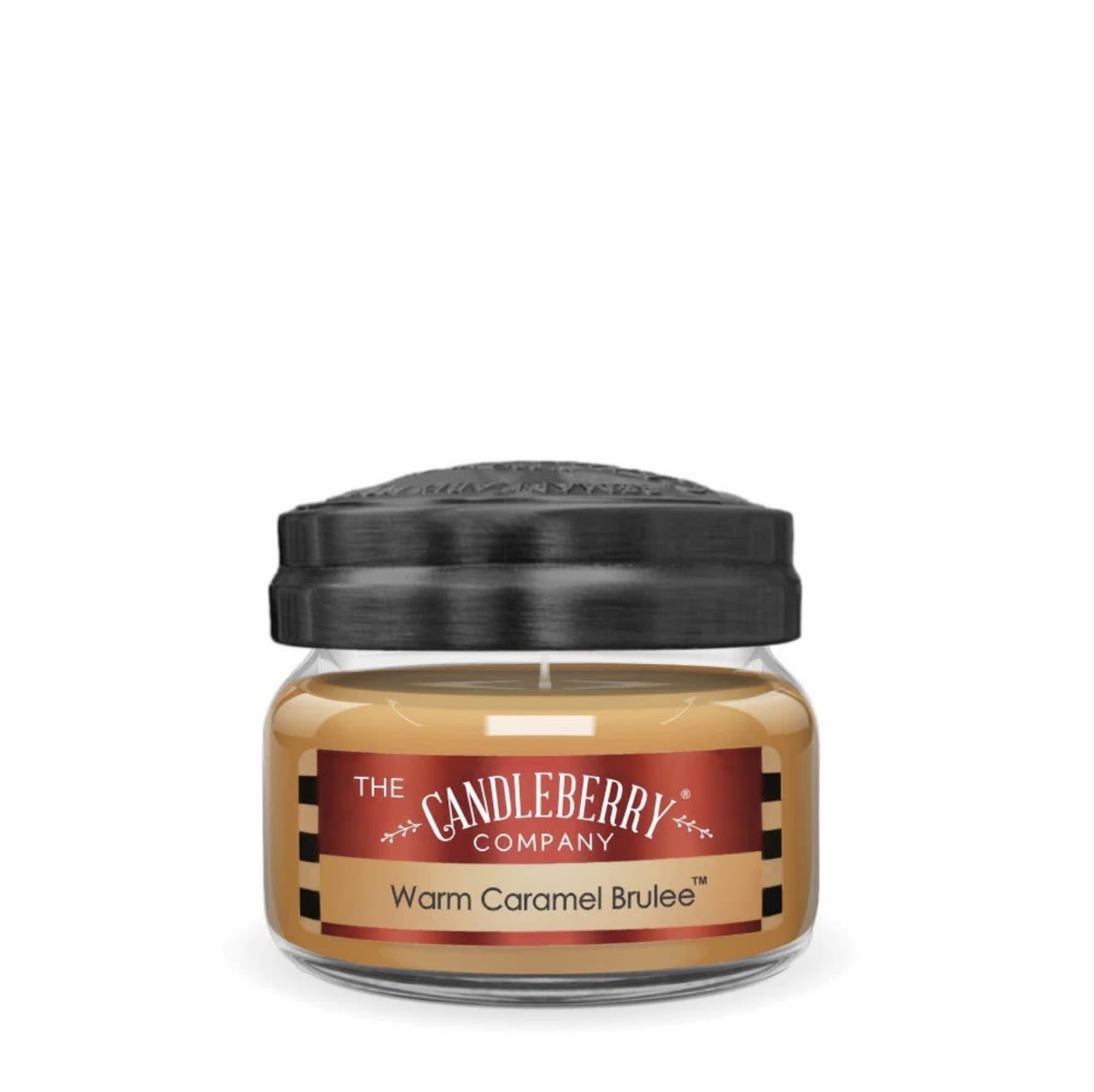 Jar candle labeled Warm Caramel Brulee