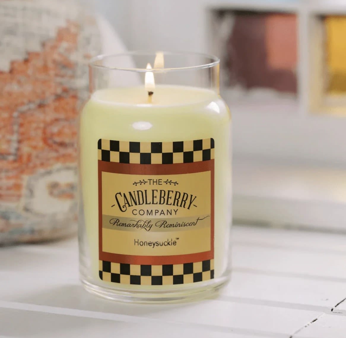 Honeysuckle™ - Large Jar Candle - Description: Honeysuckle is a truly fresh spring and summer scent that replicates the honeysuckle flower perfectly. Reminiscent of days spent picking a snack off the honeysuckle bush!  Scent Notes: Top: Sweet Honeysuckle, Fresh Green Grass Mid: Green Apple, Ylang Ylang, Muguet Base: White Musk, Wild Flowers, Jasmine  Product Details: Burn Time: 135-155 hours Wax Info: Soy Blend Wicks: Single wick - 100% lead-free Produced: Proudly Made in the USA Formula: Made with Advanced Fragrance Technology, Highly Scented, Clean burning