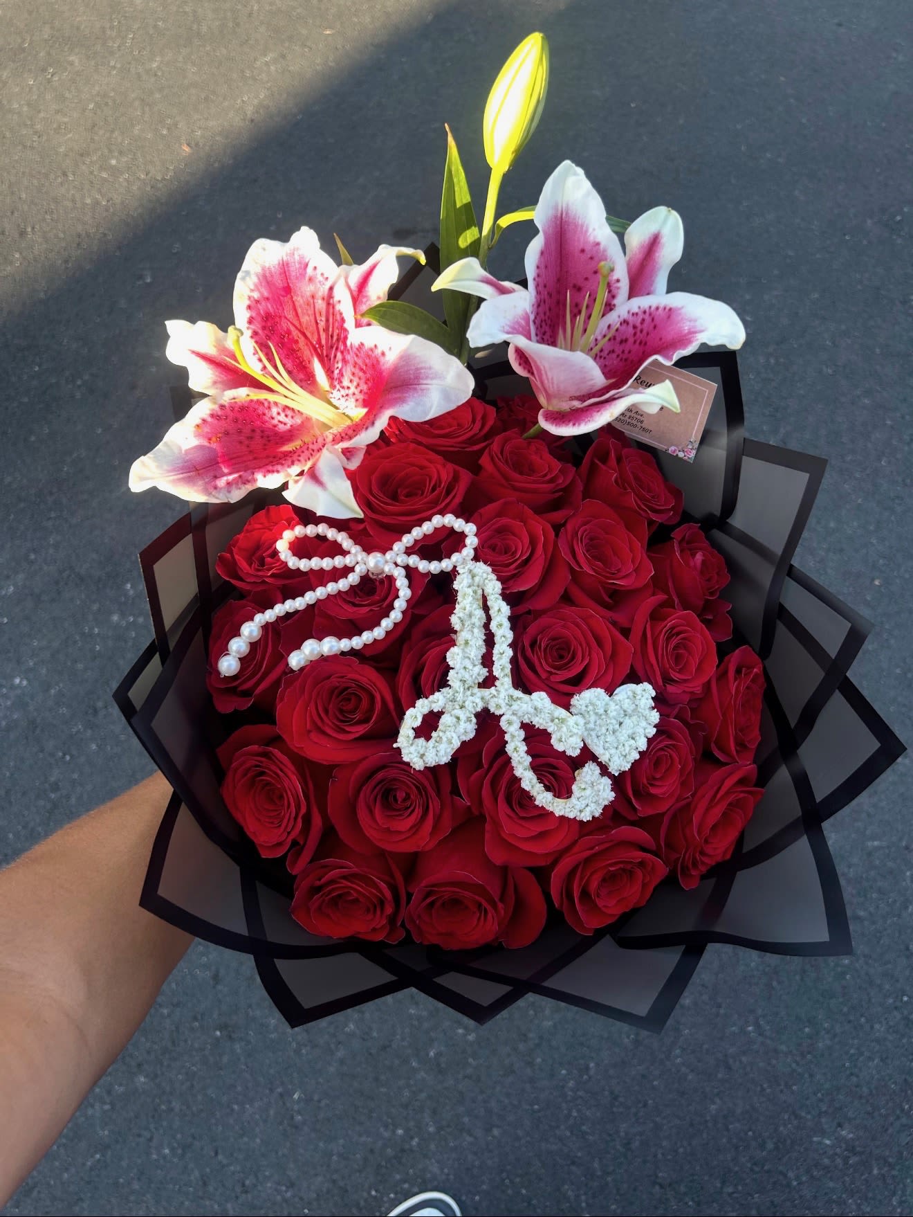 mini ramo buchon  - Red, long stem roses complemented by two large stargazing lilies and initial of your choice perfect for any and all occasions.  
