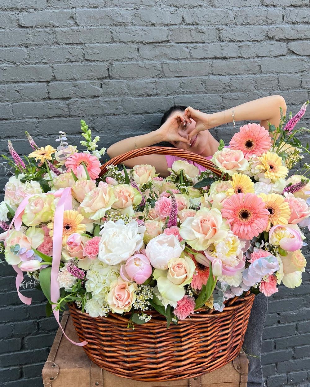 Large pastel flower basket with pink and white blooms