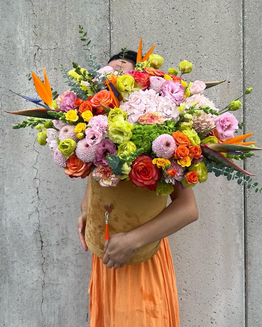 Large colorful bouquet with roses, hydrangeas, and bird of paradise flowers