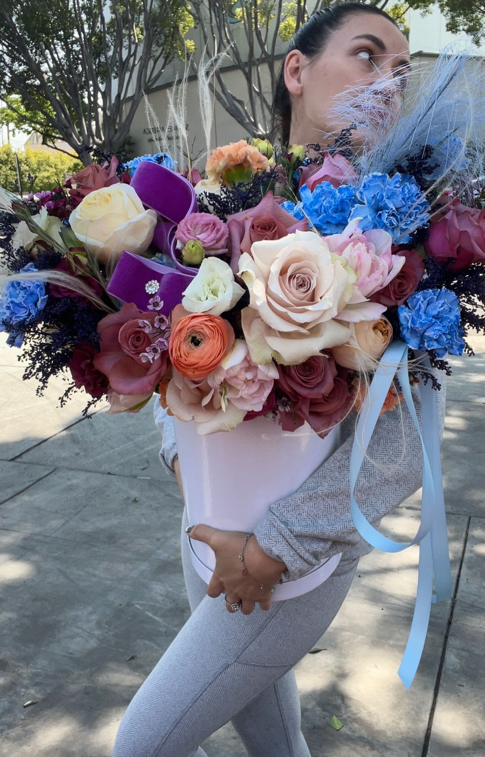 Large bouquet of mixed roses and carnations in a white box