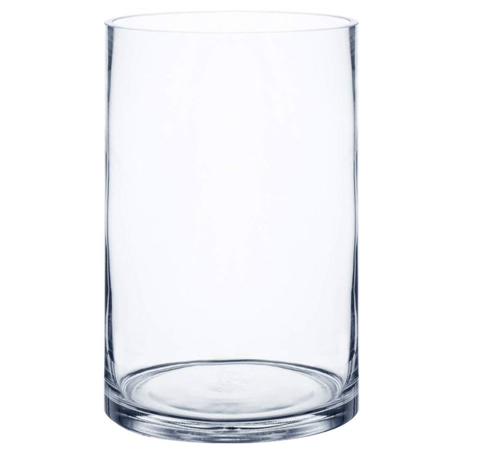 Clear cylindrical glass vase on a white background