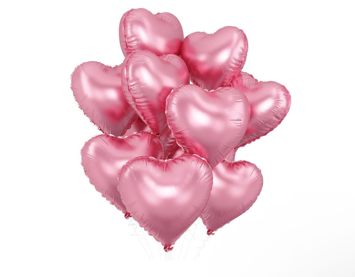 Cluster of pink heart-shaped balloons on white background