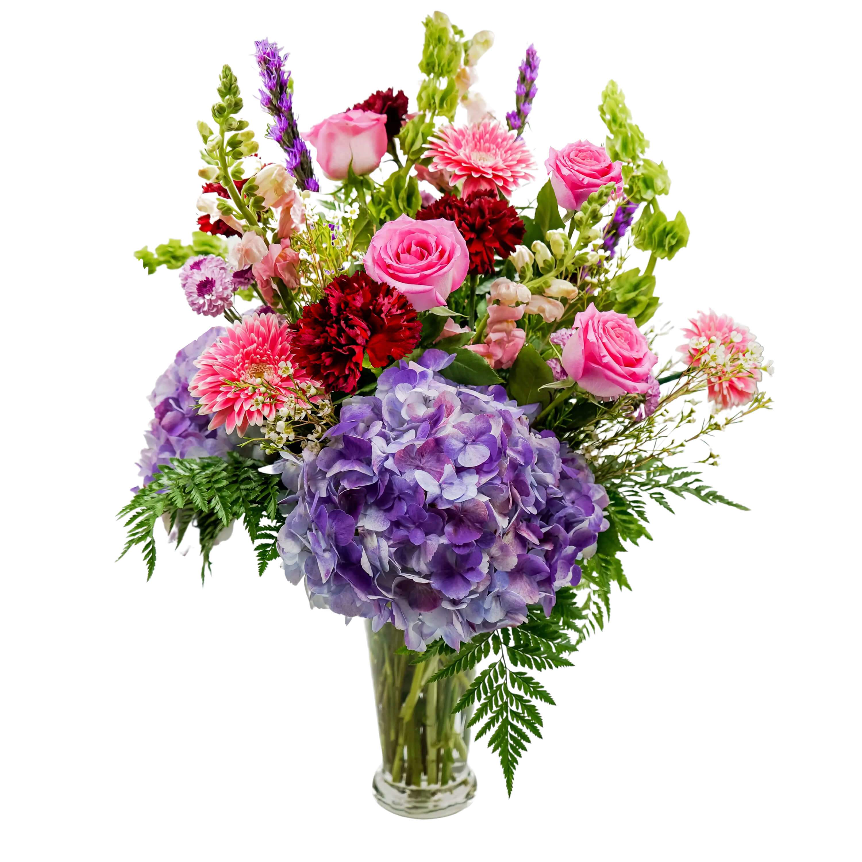 Pampered - TMF-1600 - Only the best will do! Pampered is pretty, posh and perky. Pinks and purples flowers such as hydrangea and roses are playfully designed in this fun design.  Approximately 16"W X 31"H