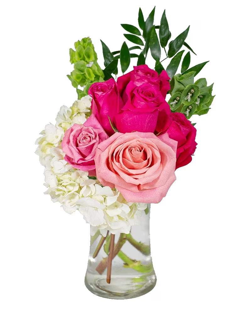 Pink Wink - A stolen glance, a sweet exchange. Pink Wink is that electrifying connection when eyes meet. Pink Roses are the star of this arrangement. 