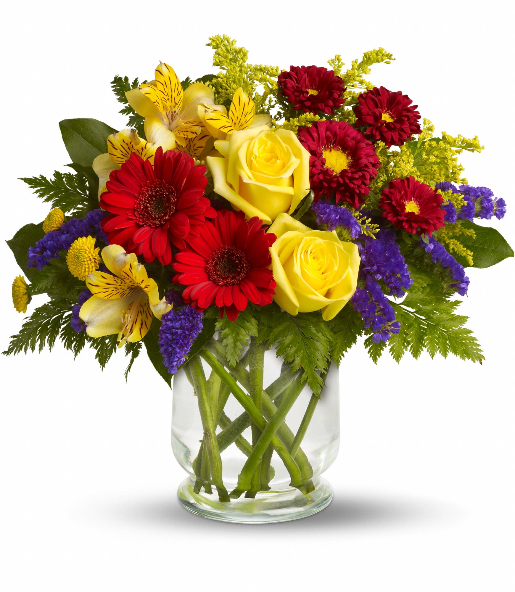 Garden Parade by Teleflora - You'll want to put this colorful bouquet on your hit parade of gifts to send. Bold primary colors and a perfect mix of flowers make it great for men and women of all ages. In other words, it's a perfect arrangement.