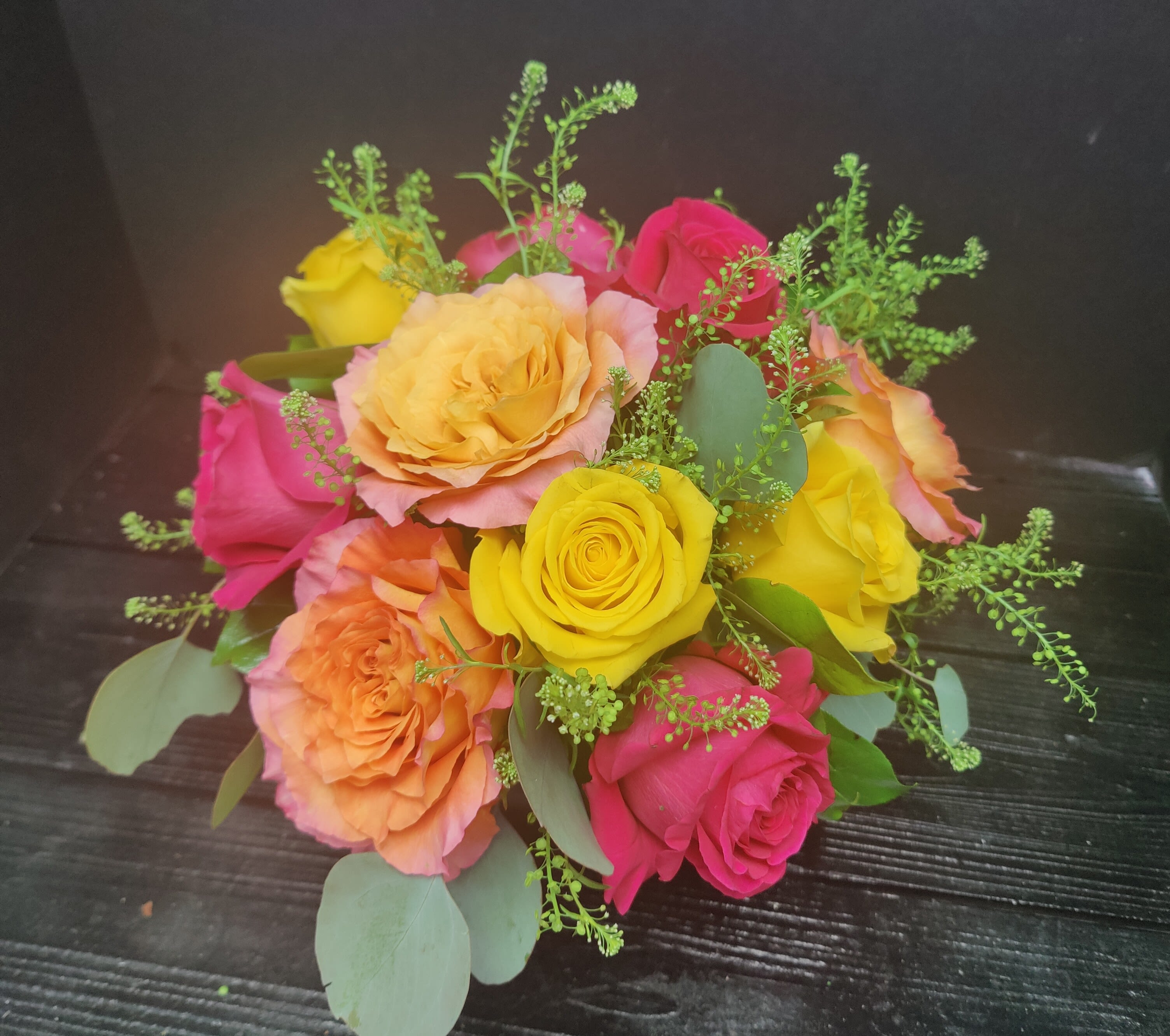 Rainbow sherbet  - Summer roses arranged with summer filler.