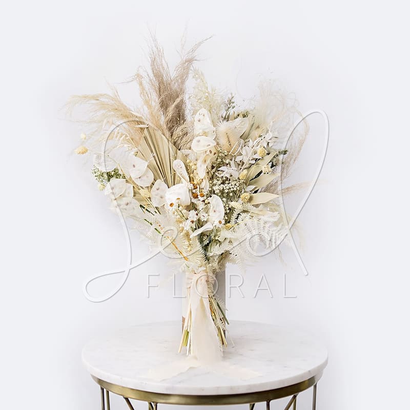 Cream and white dried bouquet with pampas grass and ribbon