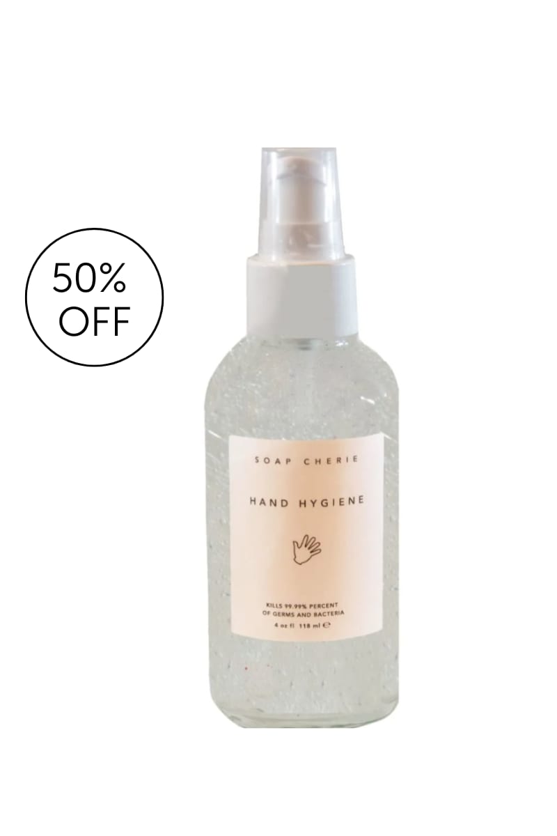 Clear hand sanitizer bottle with a spray top and discount badge