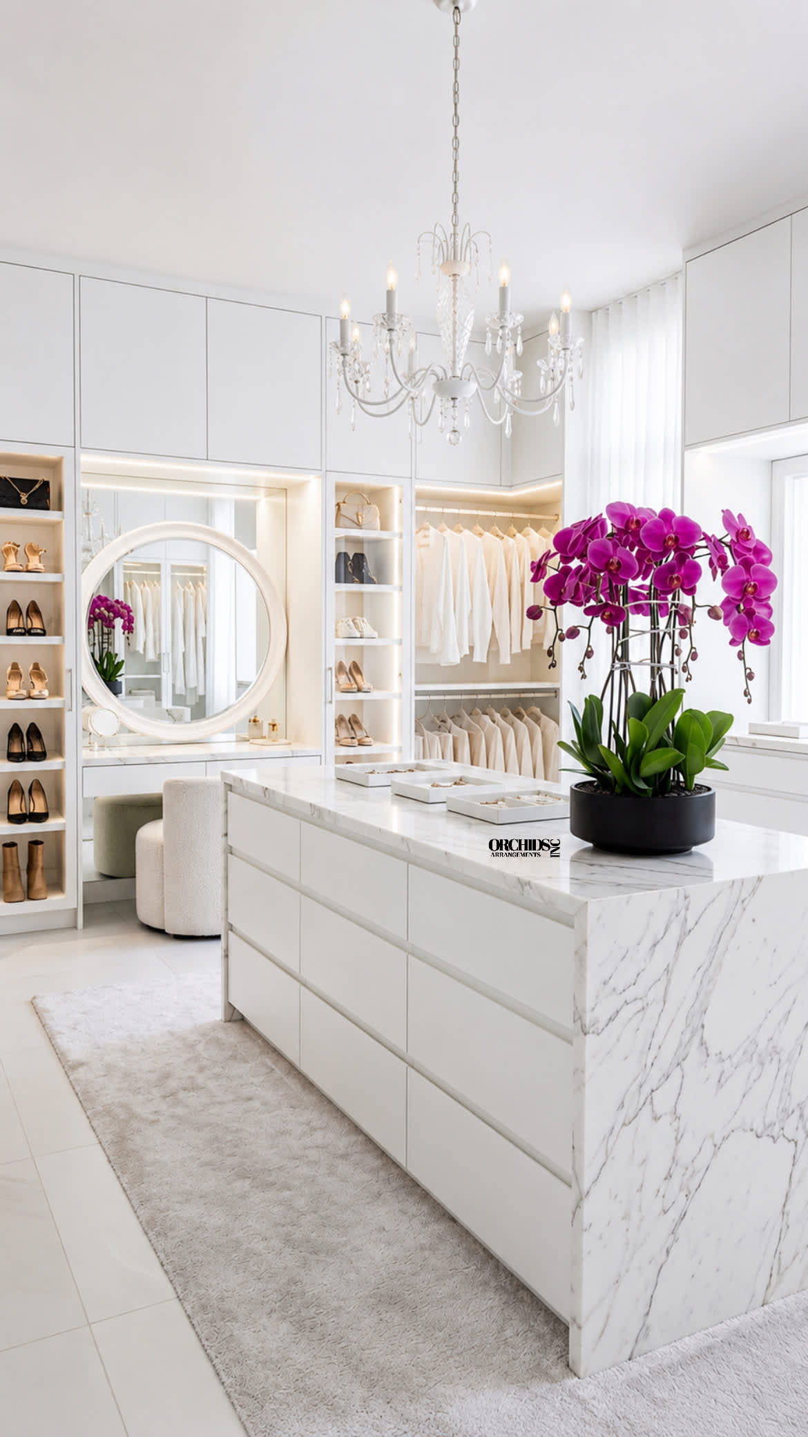 Potted purple orchids in a black planter on a marble counter