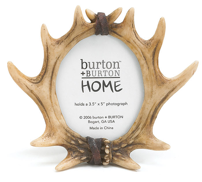 Antler-shaped photo frame holding a small picture