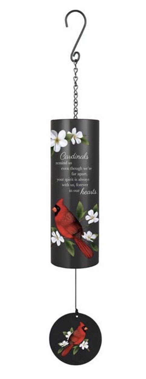 Cardinals Theme 36” Cylinder Sonnet Wind Chime - A single red cardinal perched against a deep black cylinder makes this hanging wind chime a quiet, heartfelt tribute-perfect as a sympathy or funeral remembrance. The design pairs the vivid red bird with white floral accents and green leaves so the image reads clearly from a distance, while the printed memorial sentiment offers a simple, consoling message that honors a loved one.  The 36" Cylinder Sonnet is powder-coated metal with an adjustable striker and a metal chime tube (4.375" diameter x 14" length) that produces gentle tones. A matching round wind catcher hangs below and a metal hook is included for easy hanging; a black wire easel stand is available separately for display indoors or at a service. The compact, durable construction means it can be placed in a garden, on a porch, or beside a gravesite to provide a lasting, meaningful reminder.