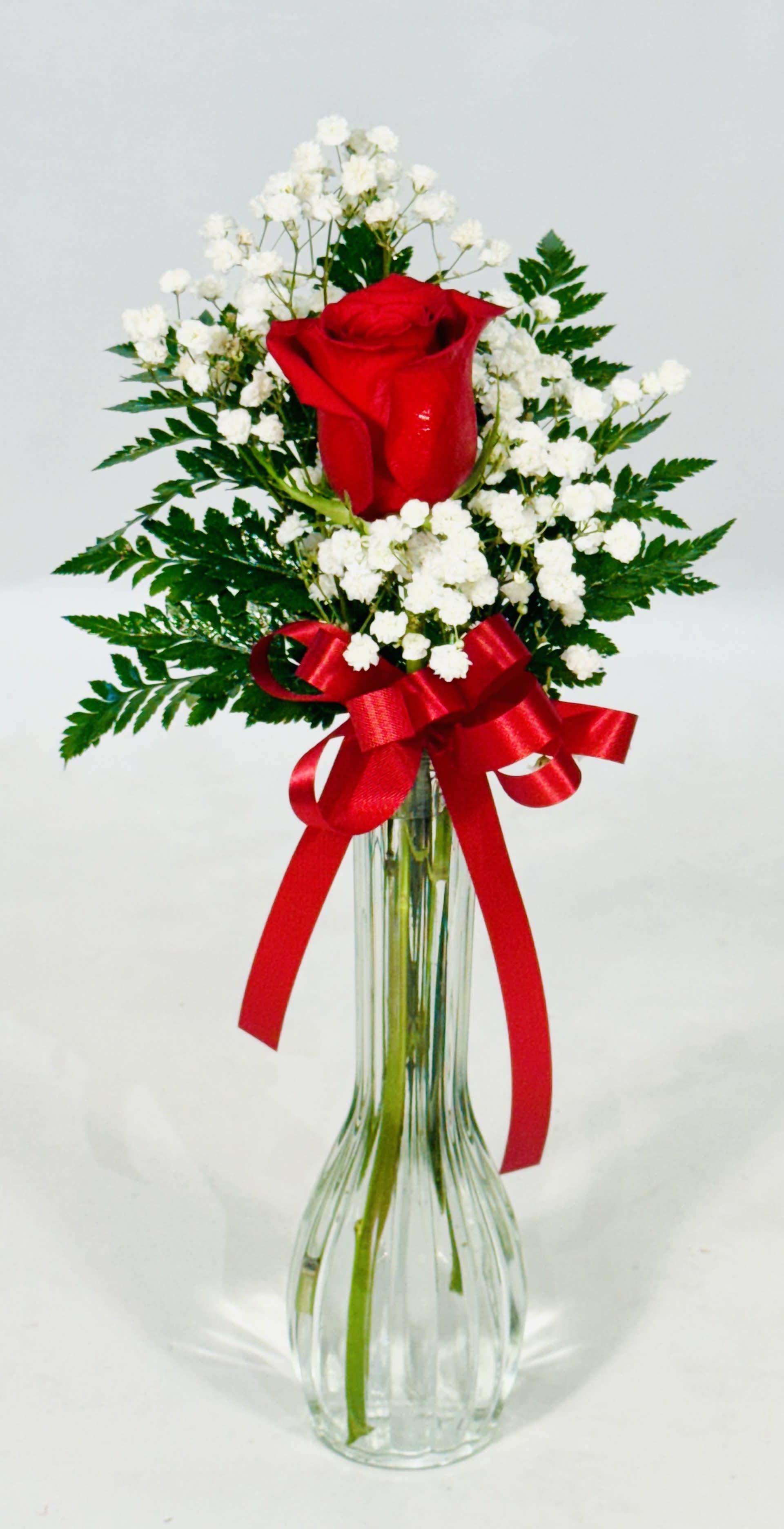 One Single Red Rose in Bud Vase  - The purest symbol of new love, love at first sight, or a “one and only love,” giving someone a single red rose symbolizes the giving of your heart.