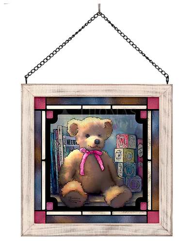 "ABC Bear for a Girl" Stained Glass  - A sweet plush teddy bear with a pink ribbon is the heart of this nursery-ready stained glass panel - a charming keepsake flower arrangement alternative perfect for a new baby girl or a birthday gift. The square art hanging reads like a vintage nursery window: a tan bear seated before pastel alphabet blocks and stacked children's books framed by geometric panes in deep blue, burgundy, and neutral tones that give the piece depth and a warm, comforting glow.  Set in a distressed white wood frame and suspended by a simple metal chain, the piece is finished with a matching bow and presented ready to hang or display on a tabletop easel. (Tabletop Easel provided with delivery or pickup.) The printed glass uses fade-resistant inks for lasting color, and the metal chain and wood frame create a sturdy, decorative accent that looks especially lovely back-lit by natural light.  A thoughtful way to welcome a newborn or celebrate a little one's birthday, this keepsake brings nostalgia and softness to a child's room without being seasonal - she'll feel loved and seen every day. Includes ready-to-hang hardware and a tabletop easel is included.  