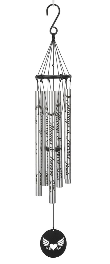 Always &amp; Forever in Our Hearts Wind Chime - A simple, reflective memorial wind chime designed to comfort and honor - the Always &amp; Forever in Our Hearts wind chime is a sympathy gift that speaks gently for you. The black circular frame suspends four hand-tuned silver tubes printed with cursive remembrance text and small wing-and-heart motifs, while a round black wind catcher featuring a white angel-wings-with-heart symbol hangs below. For funerals or quiet moments of remembrance, this piece offers a tactile, visual, and audible way to say "we remember" to the person you're honoring.  Thoughtfully built for lasting display, the stainless steel chime measures 37" from the top gathering ring to the bottom of the wind catcher and includes a 2" hanging hook and cord for easy placement. The hand-tuned tubes deliver clear, resonant tones suited to outdoor or sheltered indoor settings; the understated black finish and silver accents keep the look solemn and versatile. A simple metal easel stand is available separately (Deluxe option includes the stand) to present the chime at services or memorials, making it an appropriate keepsake that will continue to offer comfort over time. Message on Chimes: Always &amp; Forever in Our Hearts" Symbol on Wind Catcher "Angel Wings with heart center" Specifications: • Hand-tuned to provide superior tones and resonance • 2” hook for easy hanging • 37” length from the top of the gathering ring 