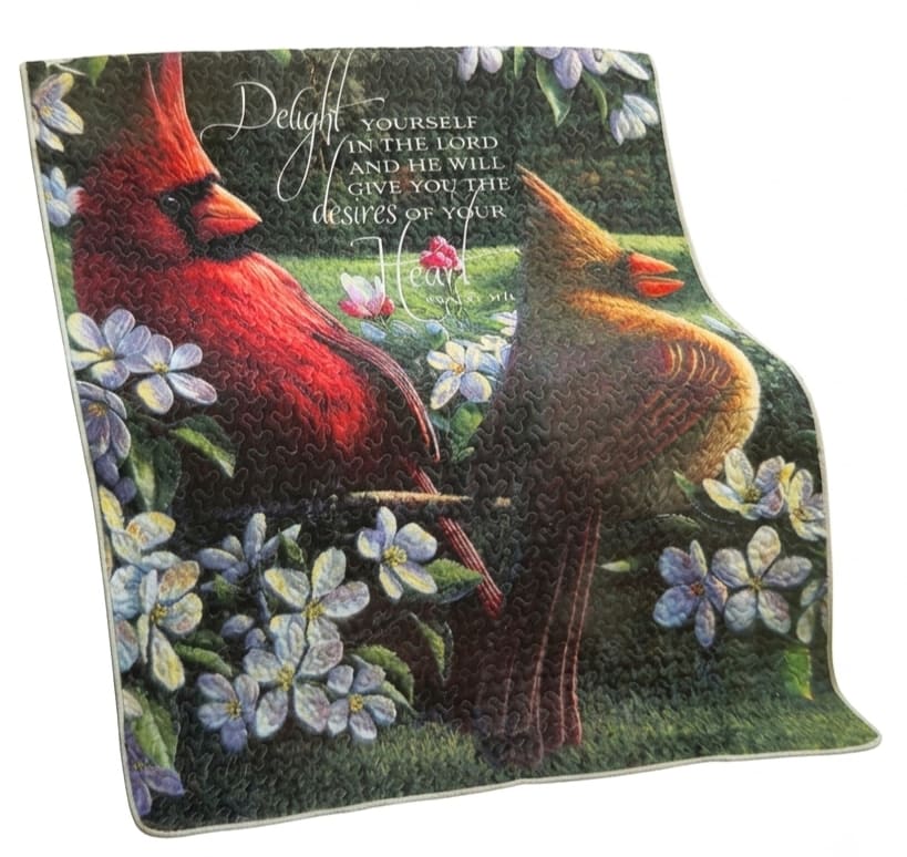 Delight Yourself In The Lord Psalm 37:4 Throw - Richly detailed cardinals-brilliant red and warm brown-perch amid pastel garden blooms on this devotional throw, making it an ideal sympathy or encouragement gift for someone who cherishes faith and nature. The printed Psalm 37:4 script across the top gives the piece a contemplative, comforting presence; for anniversary remembrances or a thoughtful "I'm praying for you" moment, this throw reads like a gentle, wearable keepsake.  Measuring 50 x 60 inches, the soft throw features a dark green field that makes the reds and lavenders pop, with touches of white and yellow in the floral accents for a soothing, balanced palette.   Perfect for gifting to someone mourning, recovering, or celebrating faith milestones, this throw wraps them in a message of hope while offering practical warmth. 