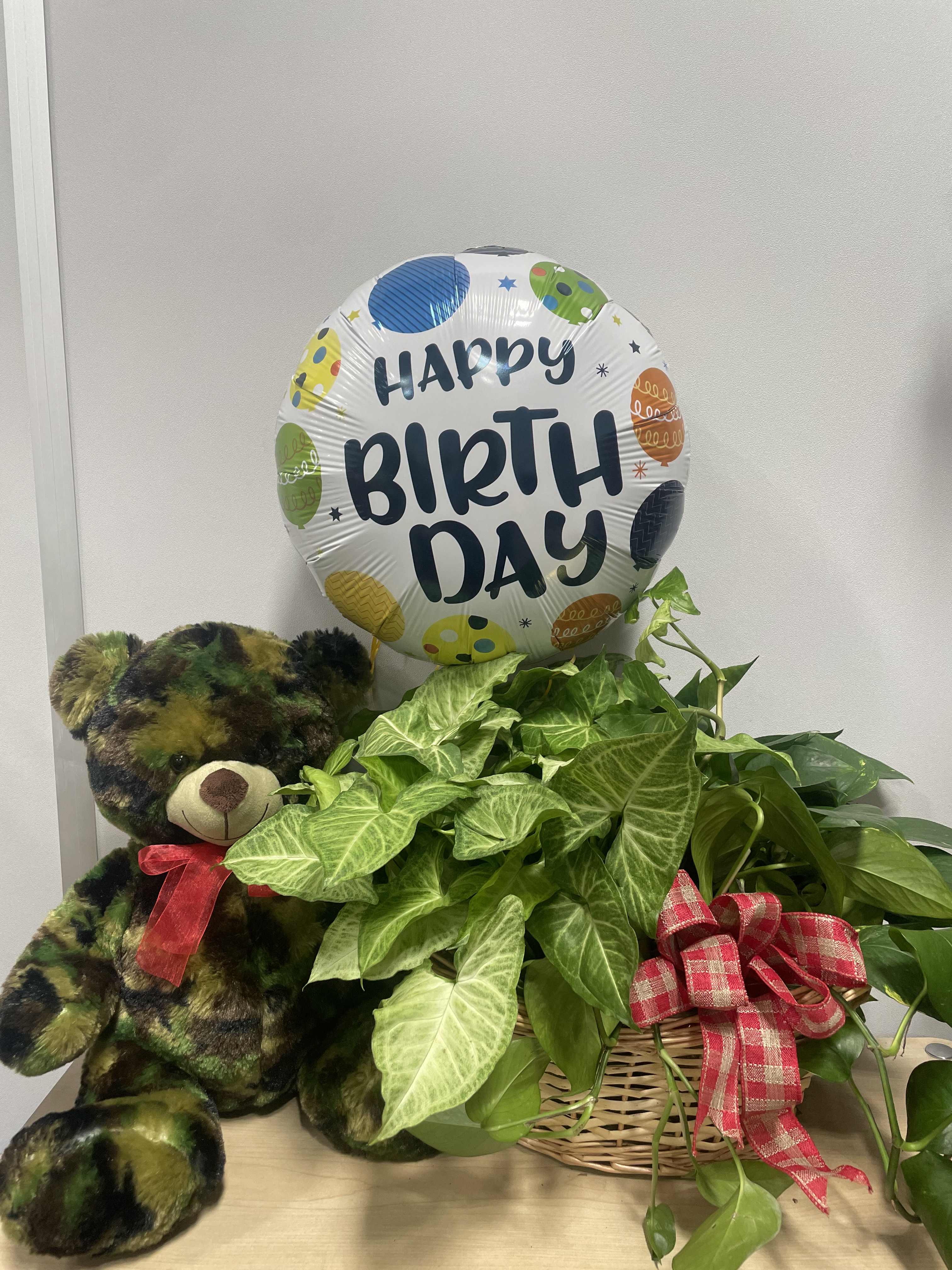 Potted plant basket with a birthday balloon and teddy bear