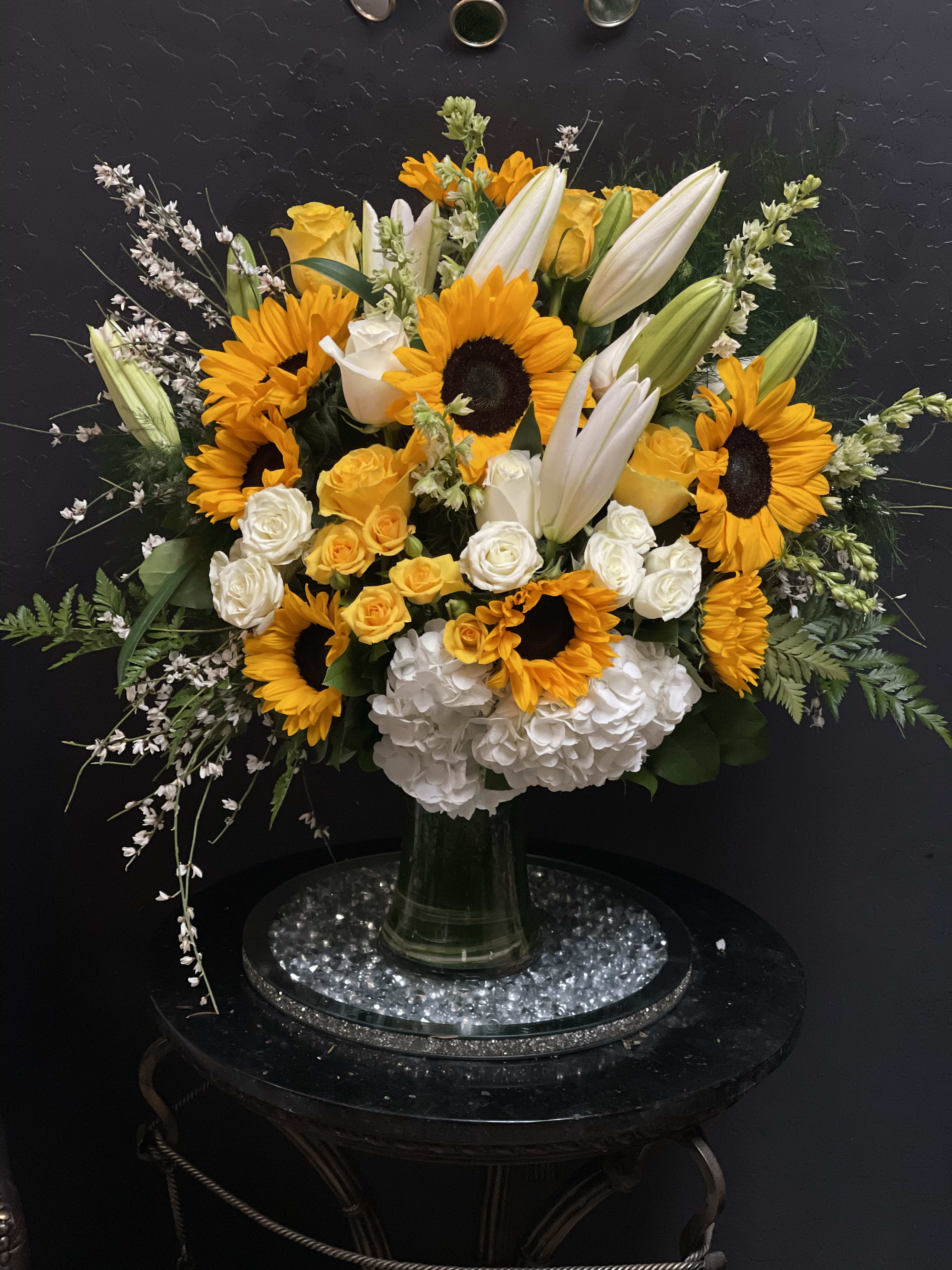 Sunny Enchanting Deluxe Bouquet - Sunflower lovers, the Sunny Enchanting Deluxe Bouquet is here for you! Loaded with sunflowers, hydrangeas, Casablanca lilies, and more! (Shown in Premium Size)