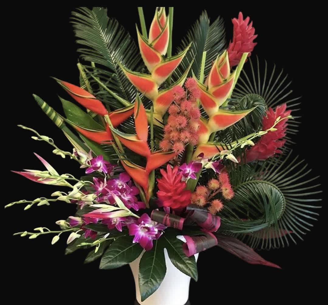 Tropical bouquet with orange heliconia and purple orchids in a white vase