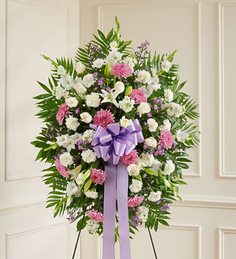 Deepest Sympathies Lavender &amp; White Standing Spray - Product ID: 91291   When you want to send a sympathy arrangement that celebrates a beautiful and unforgettable life, this lavender and white standing spray is a heartfelt choice. Expertly crafted by our florists from an assortment of the freshest blooms, itâs a lovely expression of your love and devotion during a difficult time. Standing spray arrangement of fresh lavender and white flowers such as roses, football mums, snapdragons, stock, carnations and more Appropriate for family, friends or business associates to send directly to the funeral home Our florists use only the freshest flowers available, so colors and varieties may vary Large measures approximately 56"H x 36"L without easel Medium measures approximately 42"H x 34"L without easel Small measures approximately 40"H x 32"L without easel