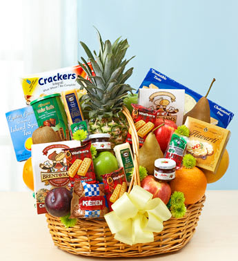 Deluxe Fruit and Gourmet Basket for Sympathy - Product ID: 91497  Express your deepest sympathies to friends or family members with our hand-delivered basket of comforting orchard-fresh fruit and gourmet foods. Comforting basket of orchard-fresh fruit and gourmet snacks includes a generous selection of apples and oranges, grapefruit, pears, sausage, cheese, crackers, cookies and more, accented with fresh poms Selected and arranged by our expert florists This basket is meant to be sent to the home of friends or family members and cannot be delivered to the funeral home Extra-Large gift basket measures approximately 21"H x 15"W Large gift basket measures approximately 18"H x 12"W Medium gift basket measures approximately 13"H x 12"W Small gift basket measures approximately 12"H x 11"W Fruit and snack assortment, floral and basket may vary due to local availability