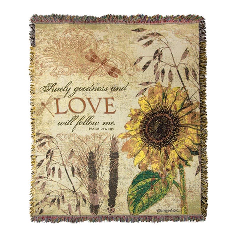 Decorative woven blanket with a sunflower and the words "LOVE will follow me"