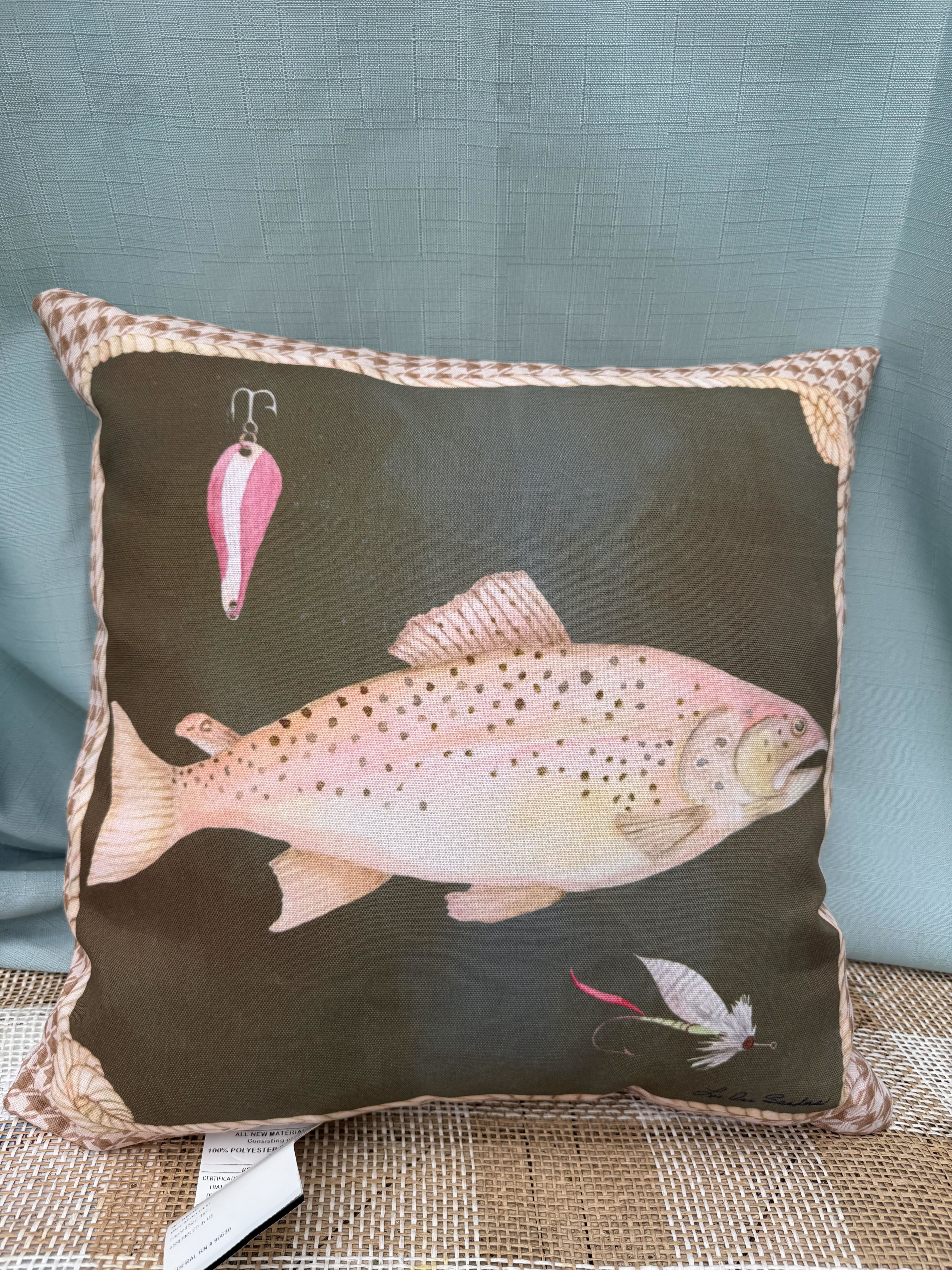 REVERSABLE FISH PILLOW - A charming pillow with different fish designs on either side.
